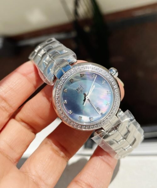 TAG LADIES BLUE DIAL DIAMOND BEZEL RONDA QUARTZ MOVEMENT SS STEEL STRAP